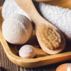 Spa composition with coffee bath bombs and coffee beans.